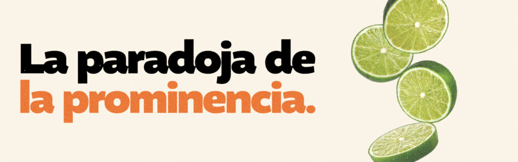 Portada del artículo “La paradoja de la prominencia” con tipografía en negro y naranja acompañada de rodajas de limón como símbolo visual.